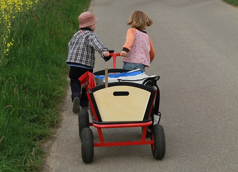 children pulling cart 